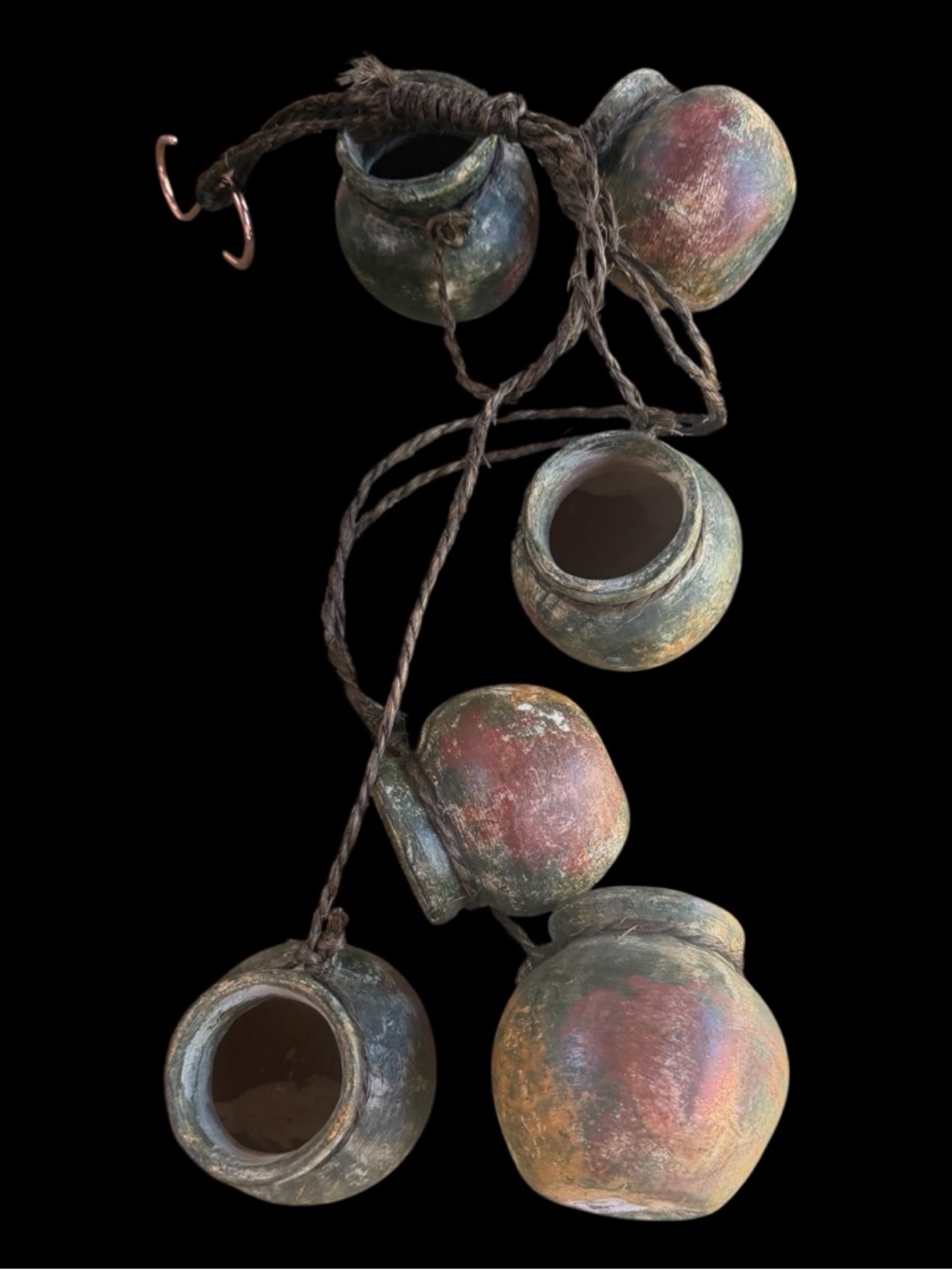 Decorative rustic clay ristra pots (6) strung together with rope. Mexico